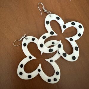White Floral Cutout Drop Earrings with Black Dot Accents